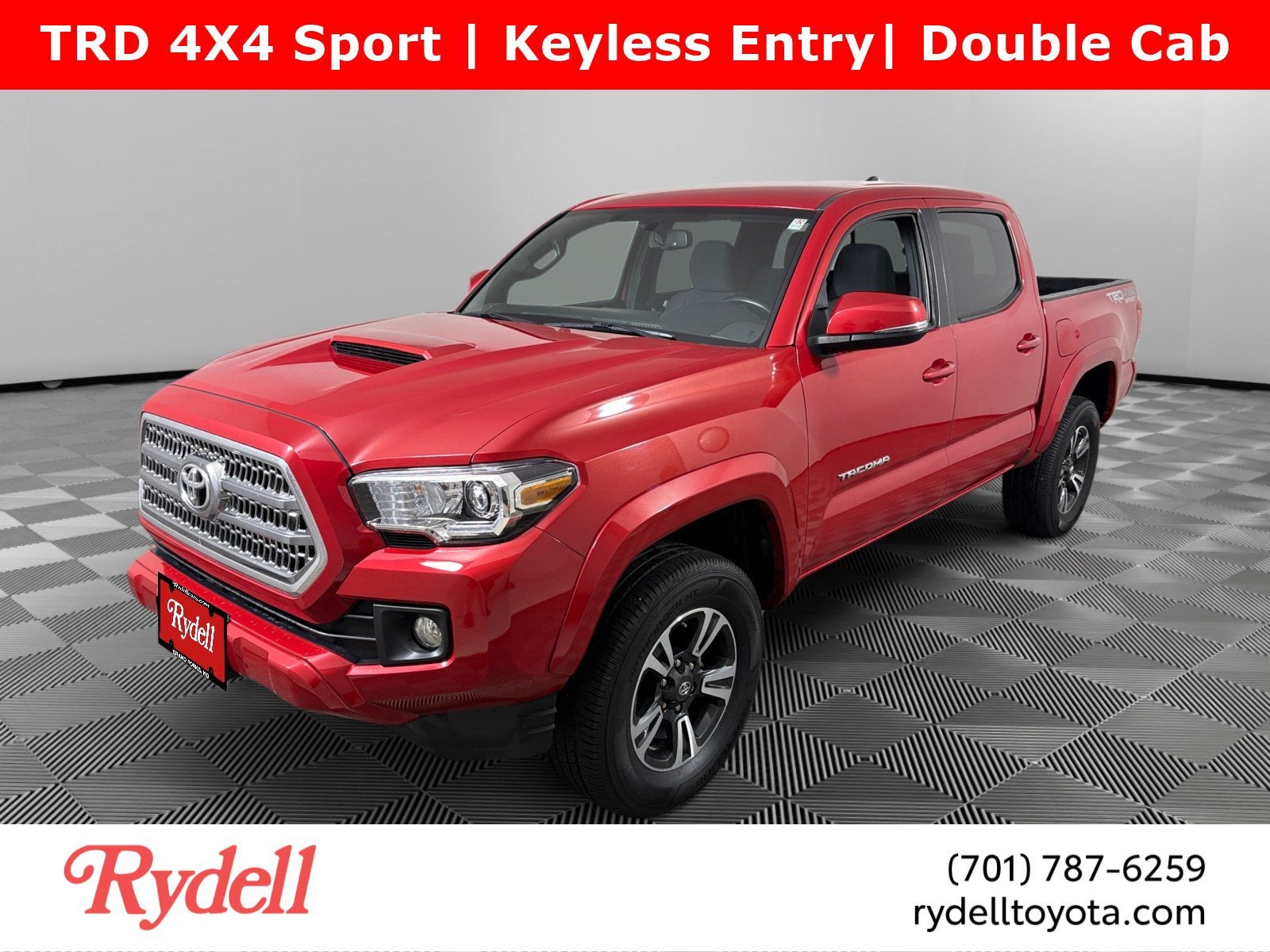 2016 Toyota Tacoma TRD Sport in Ruby Flare Pearl — front three-quarter view