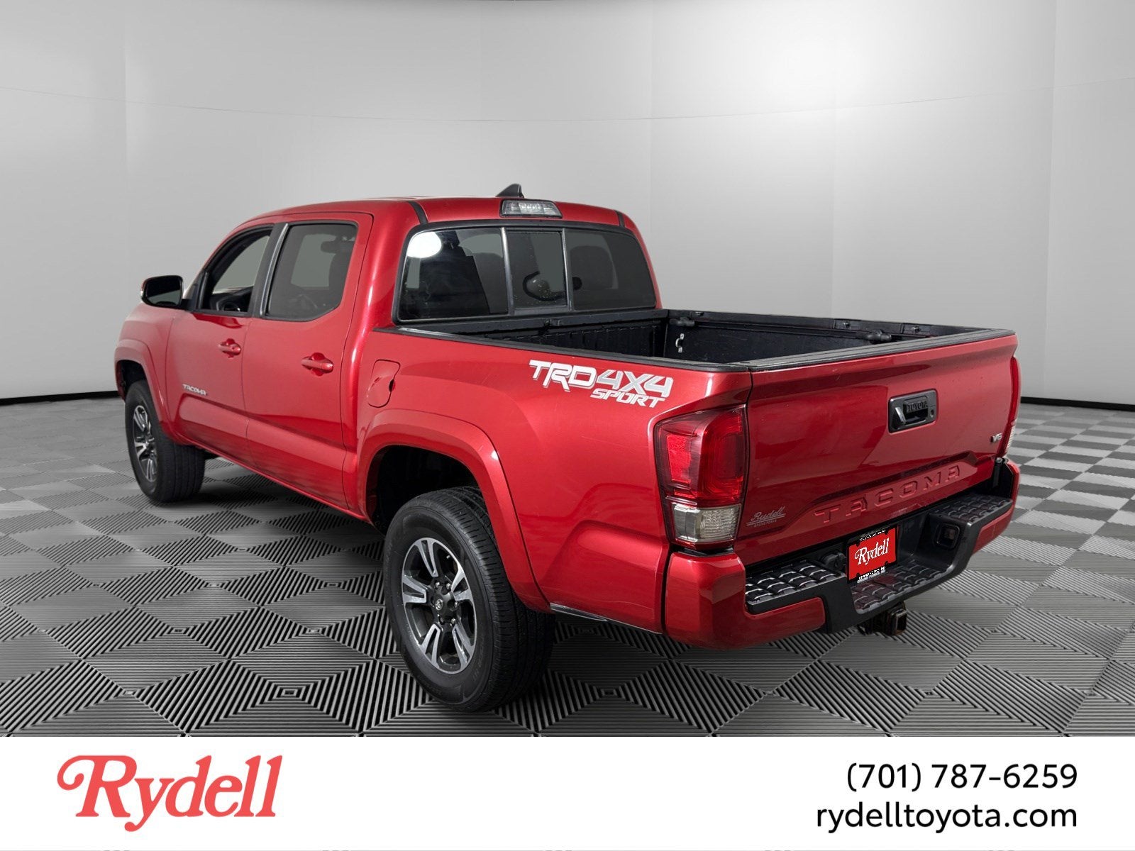 2016 Toyota Tacoma — rear three-quarter view