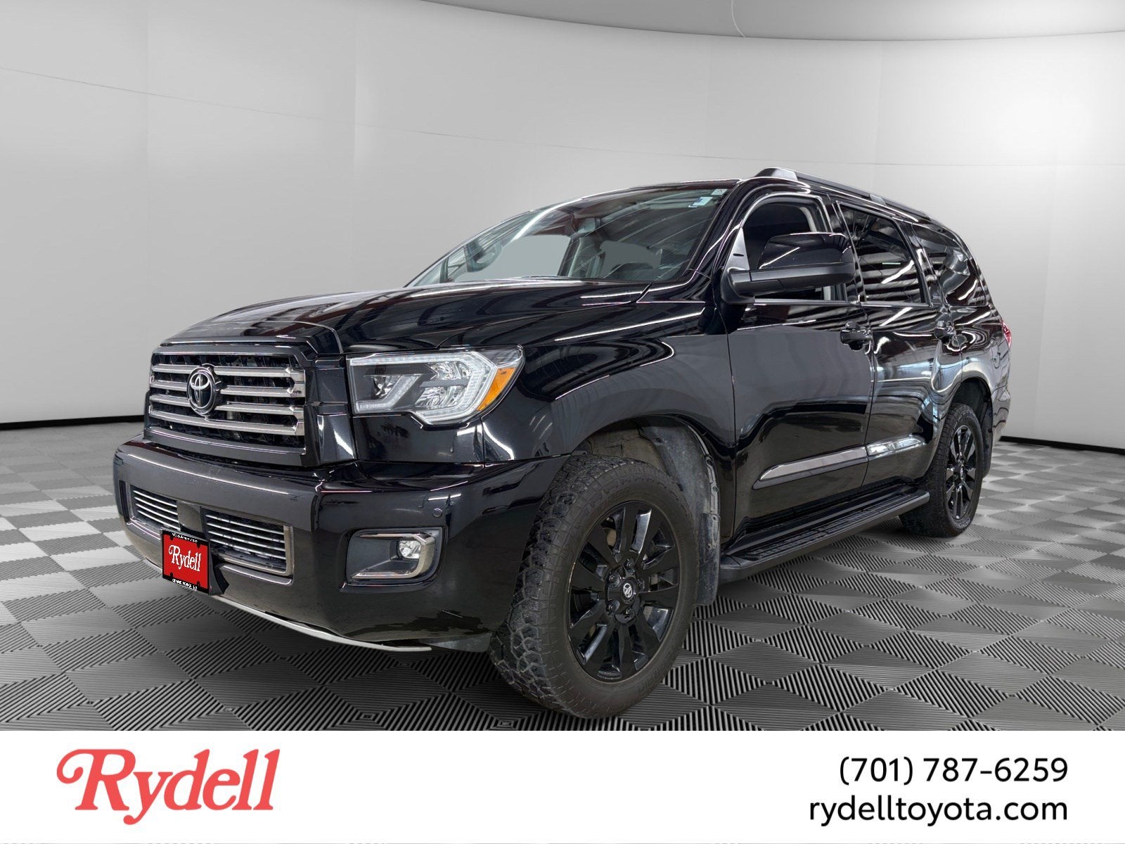 2021 Toyota Sequoia Nightshade in Midnight Black — front three-quarter view