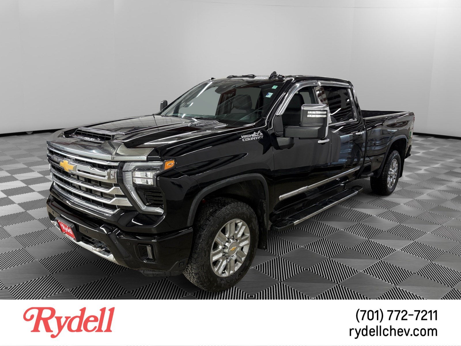 2024 Chevrolet Silverado 3500 HD High Country in Black — front three-quarter view