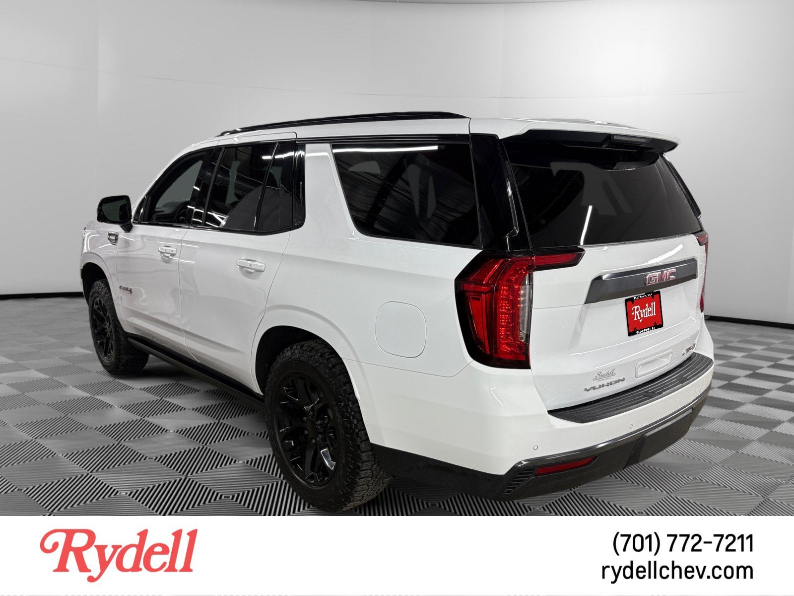 2023 GMC Yukon — rear three-quarter view