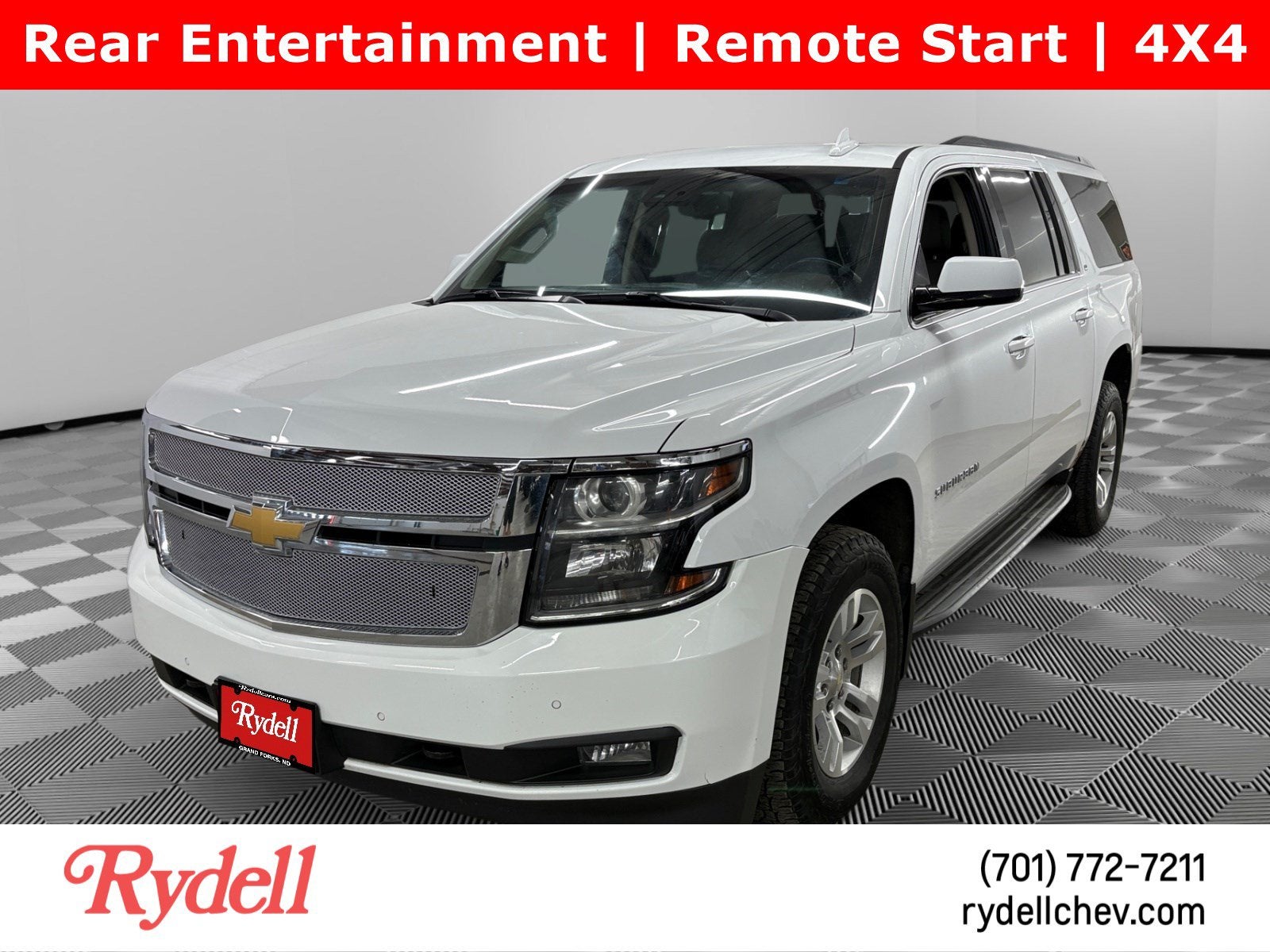 2018 Chevrolet Suburban LT in Summit White — front three-quarter view