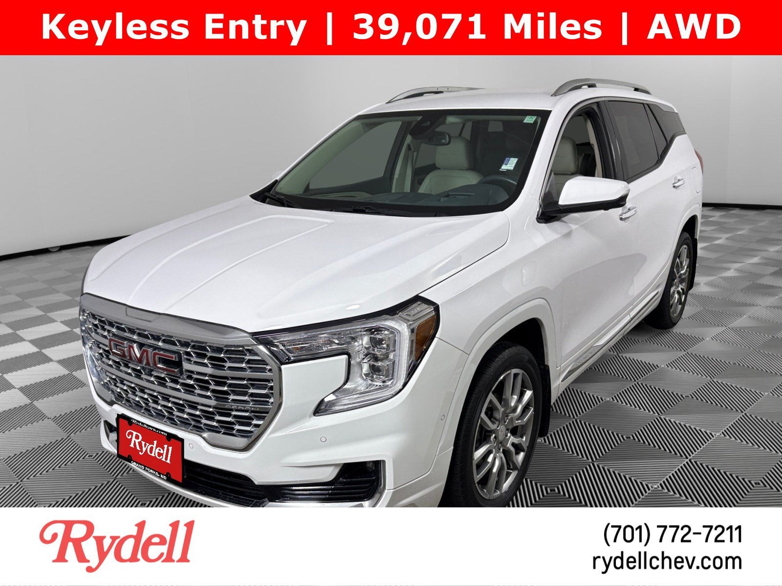 2023 GMC Terrain Denali in Summit White — front three-quarter view