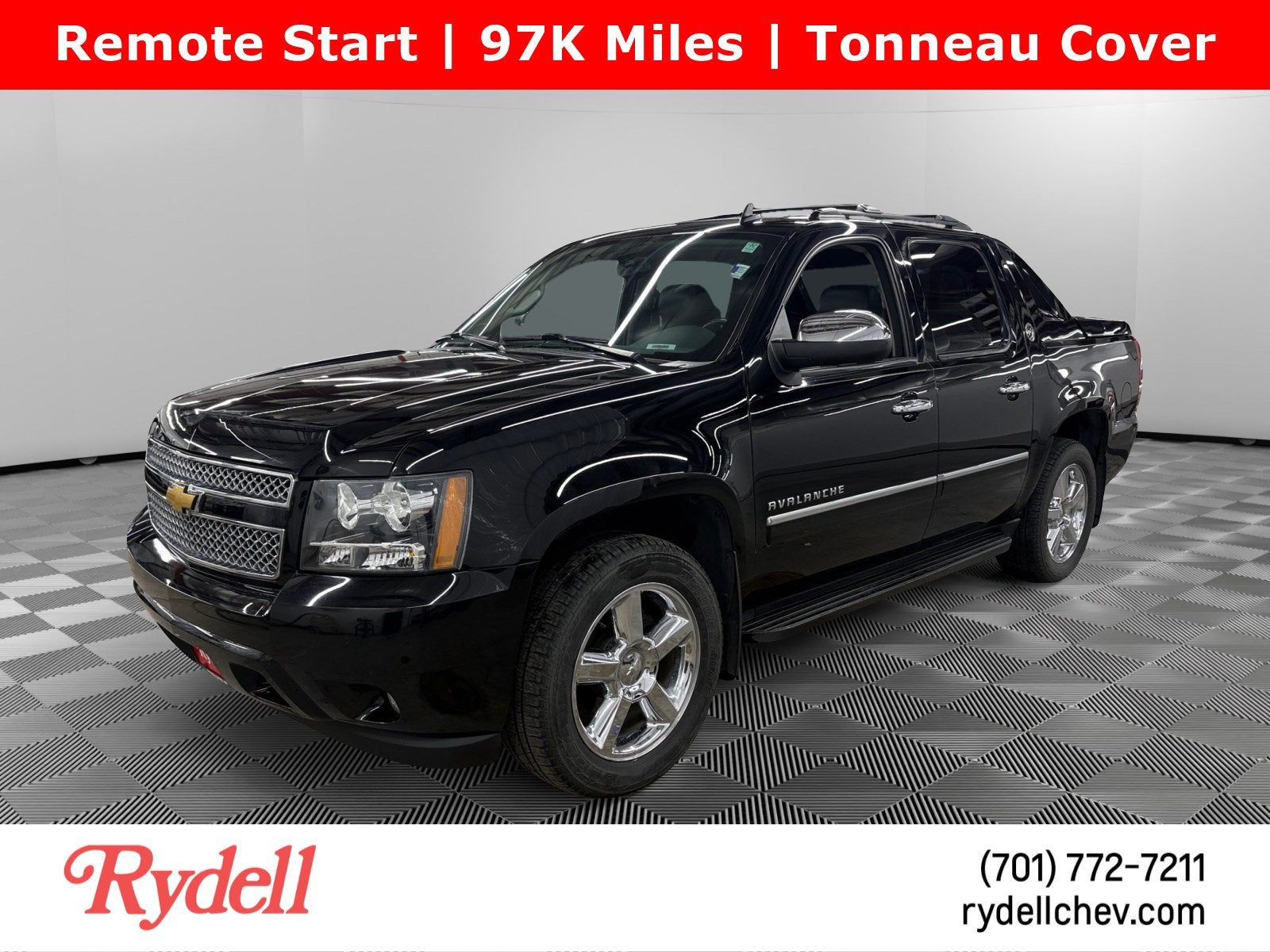 2013 Chevrolet Avalanche LTZ in Black — front three-quarter view