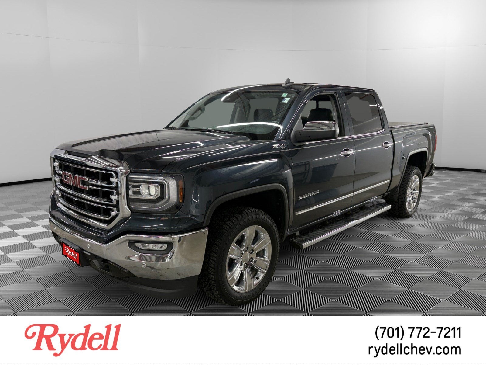 2017 GMC Sierra 1500 SLT in Dark Slate Metallic — front three-quarter view