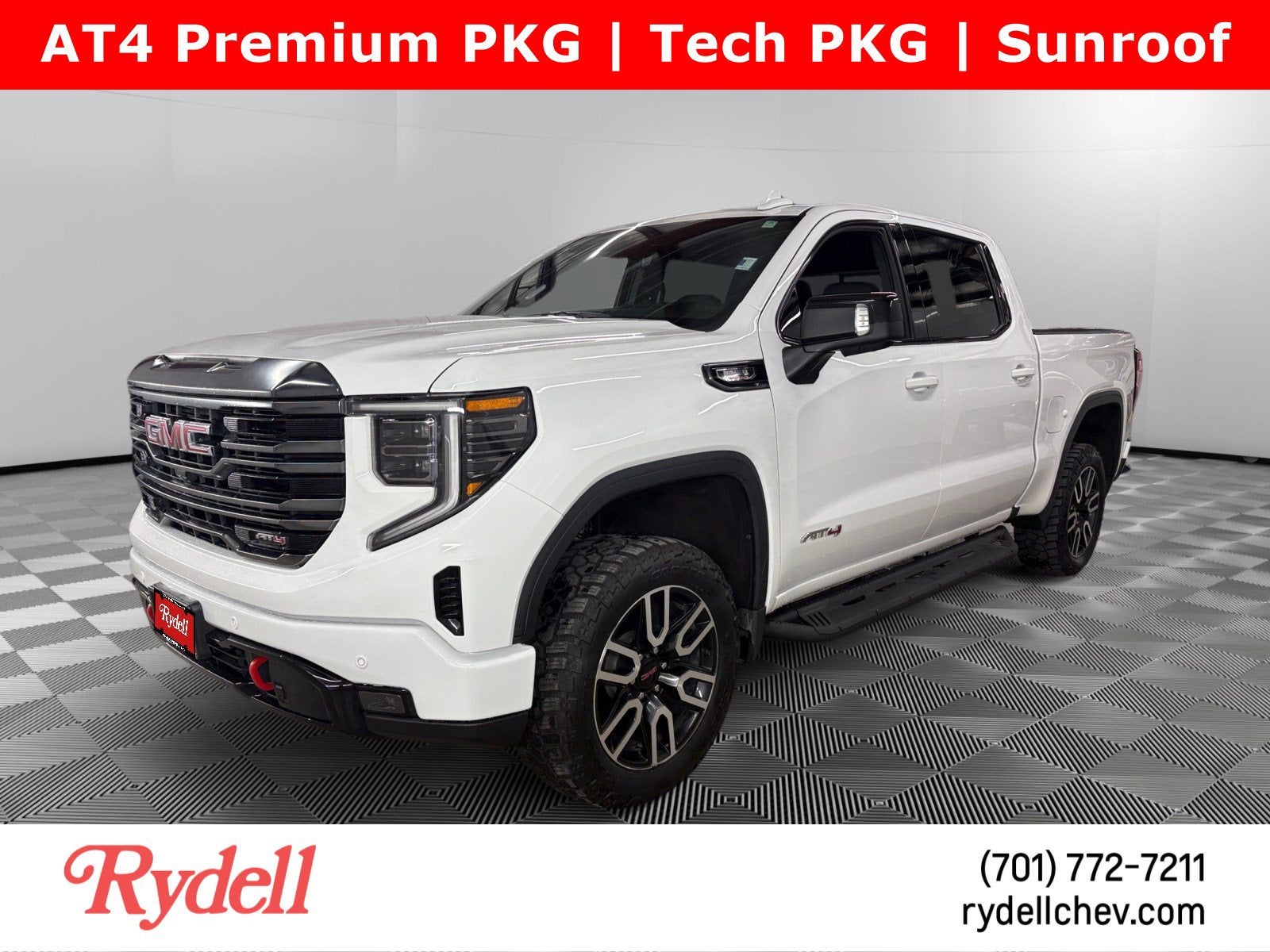 2024 GMC Sierra 1500 AT4 in Summit White — front three-quarter view
