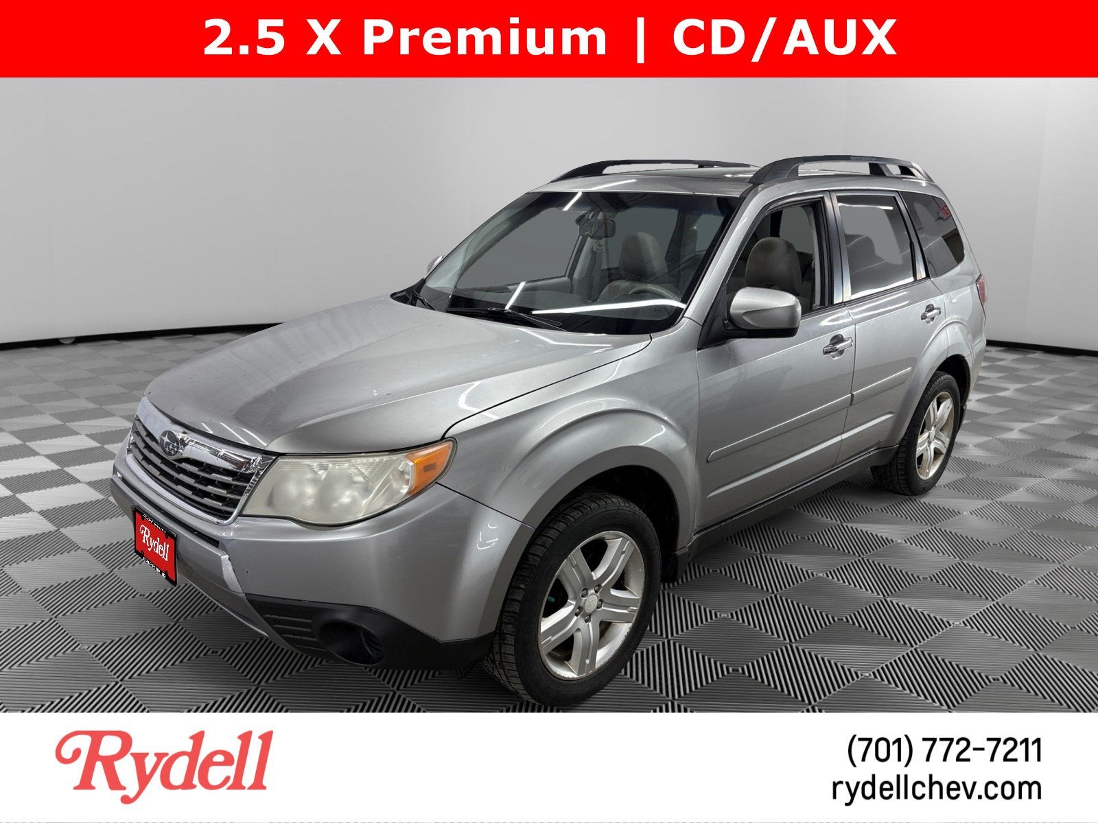 2009 Subaru Forester 2.5X in Silver — front three-quarter view