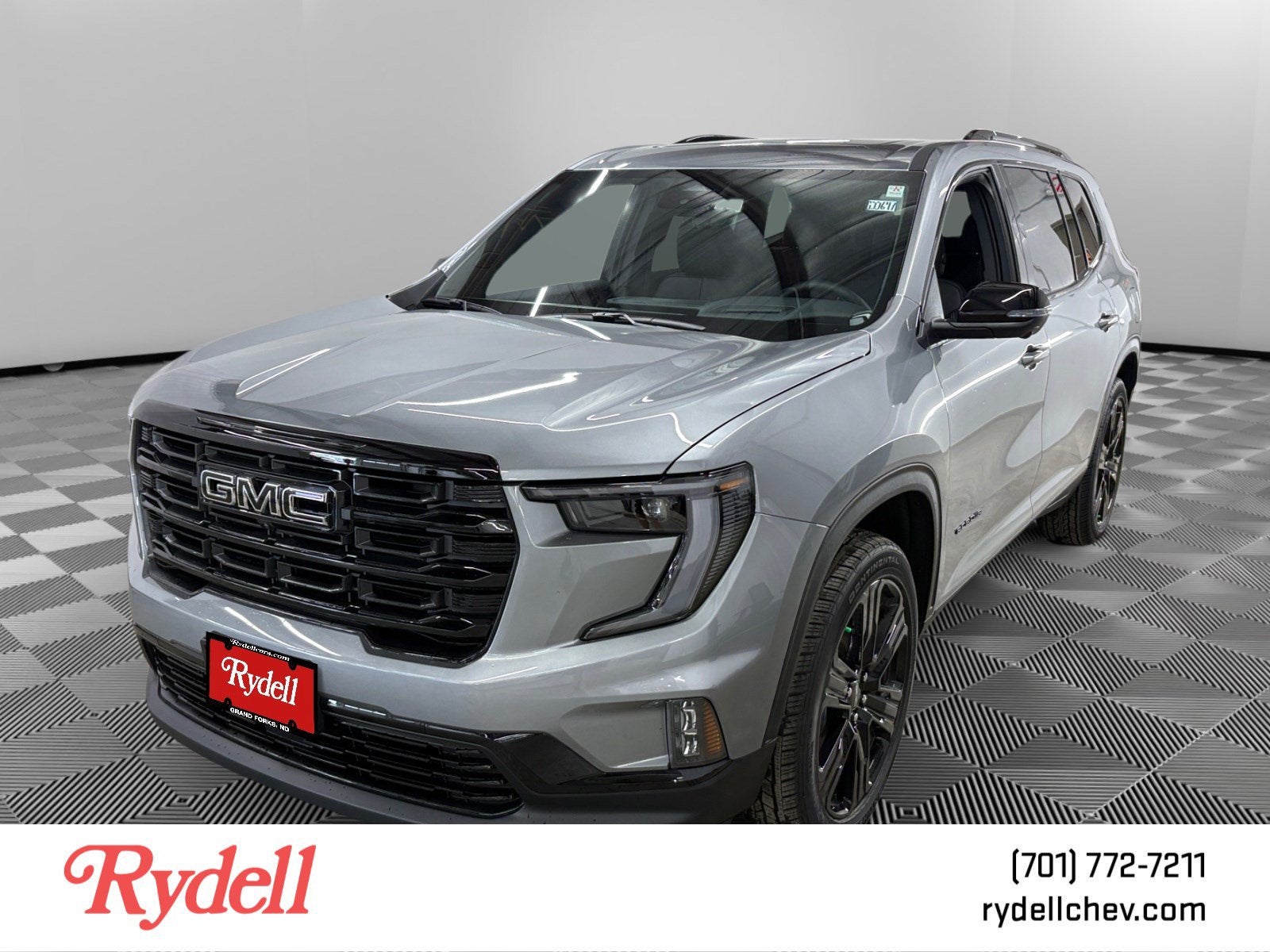 2026 GMC Acadia Elevation in Sterling Metallic — front three-quarter view