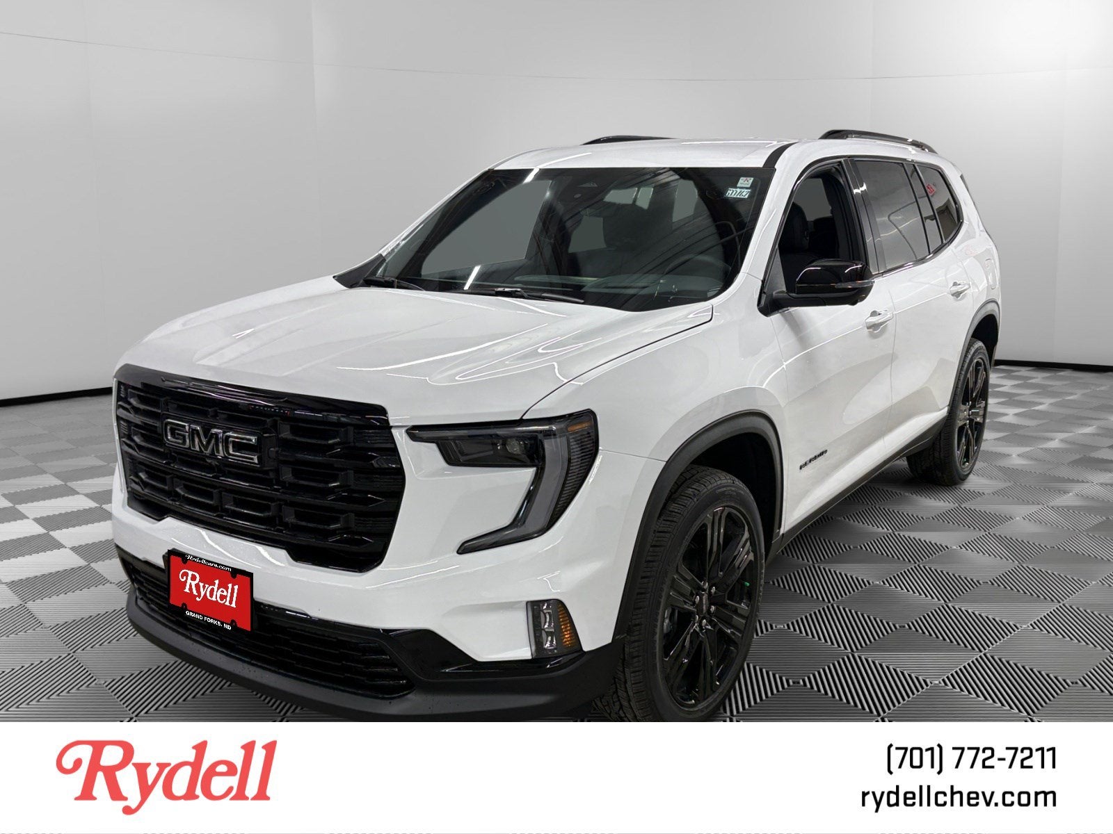 2026 GMC Acadia Elevation in Summit White — front three-quarter view