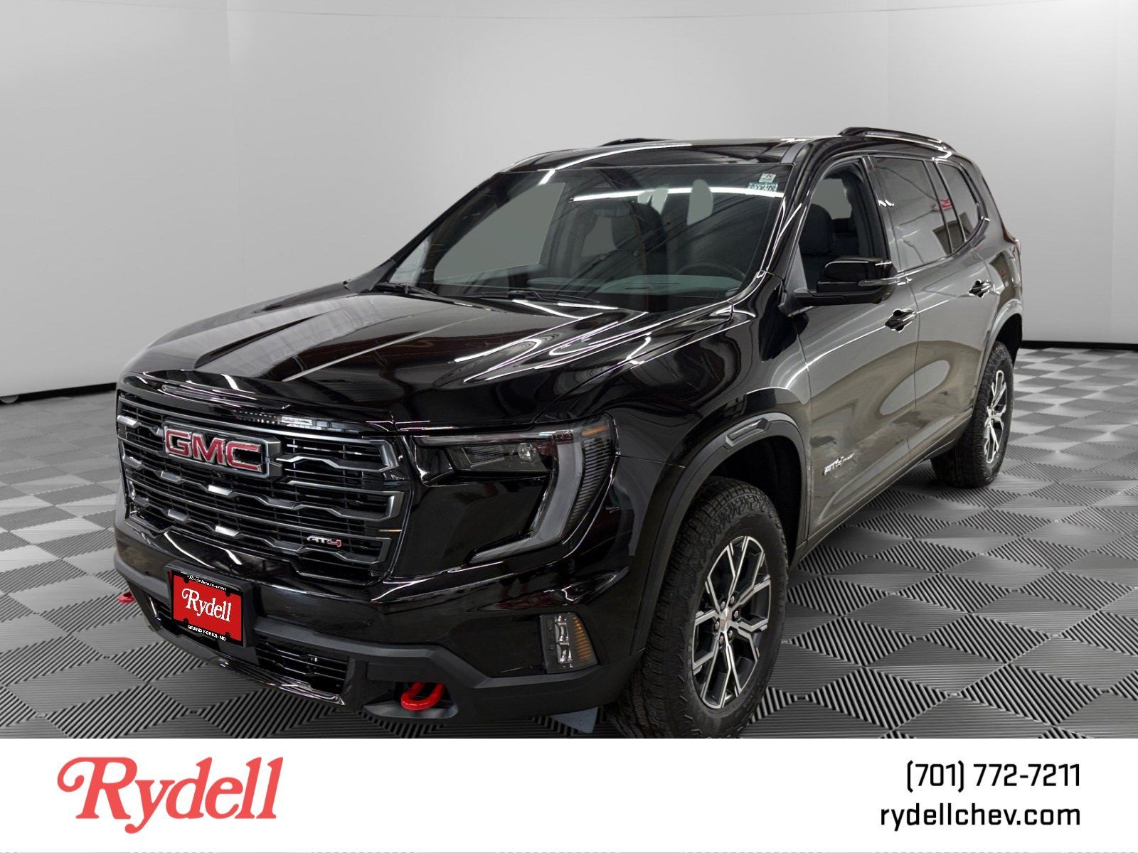2026 GMC Acadia AT4 in Ebony Twilight Metallic — front three-quarter view