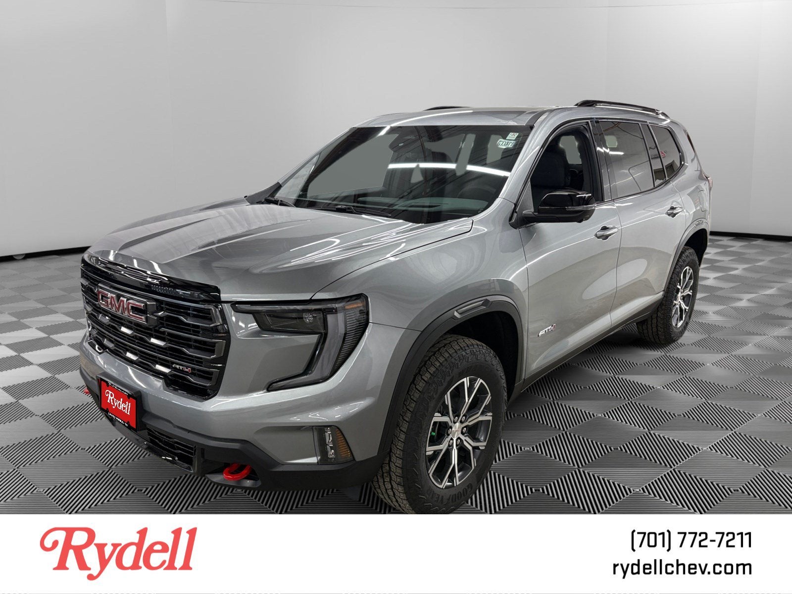 2026 GMC Acadia AT4 in Sterling Metallic — front three-quarter view