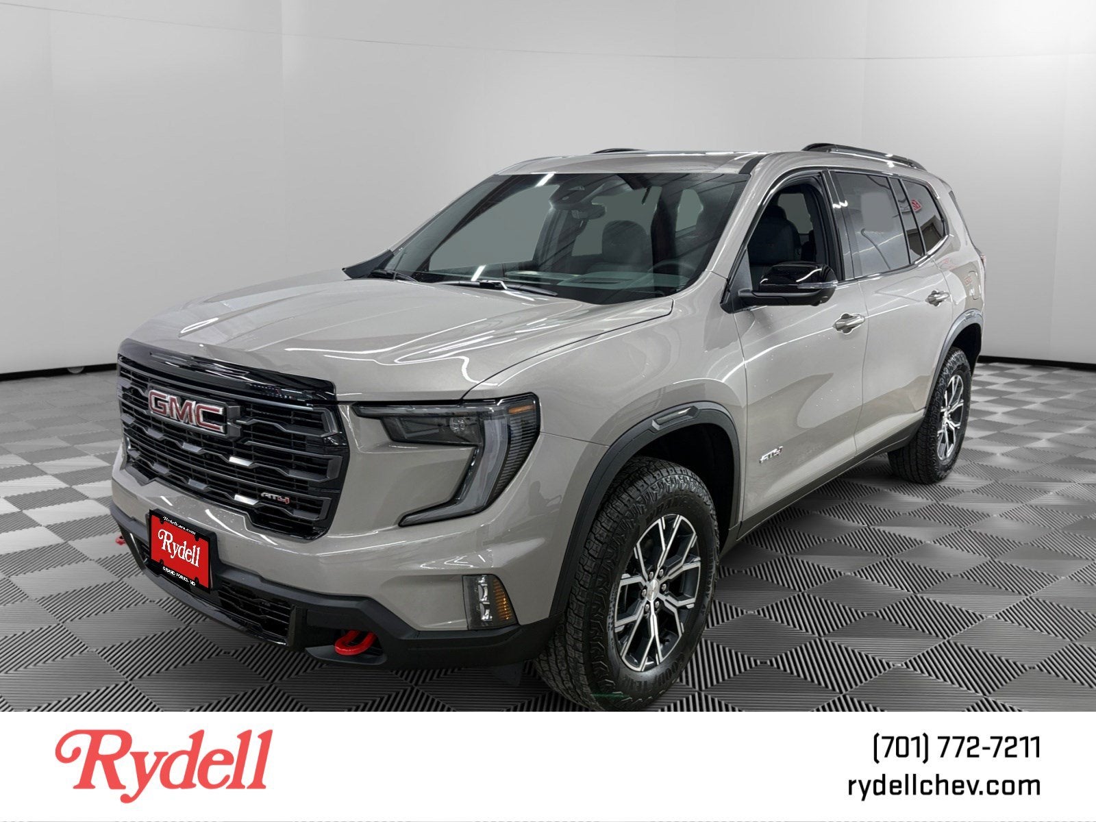 2026 GMC Acadia AT4 in Riverstone Metallic — front three-quarter view