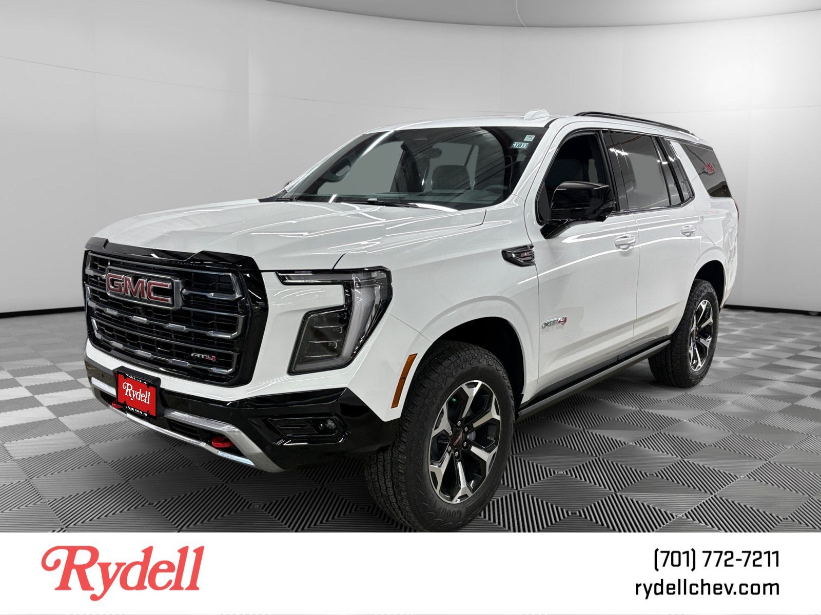 2026 GMC Yukon AT4 in Summit White — front three-quarter view