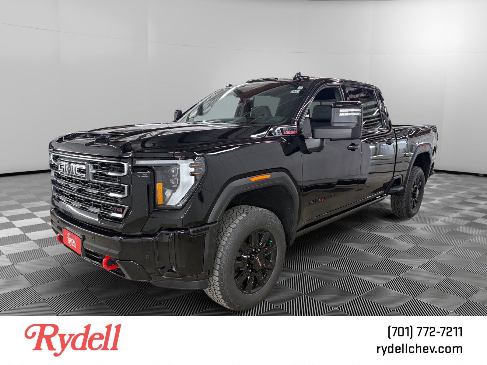 2026 GMC Sierra 3500 HD AT4 in Onyx Black — front three-quarter view