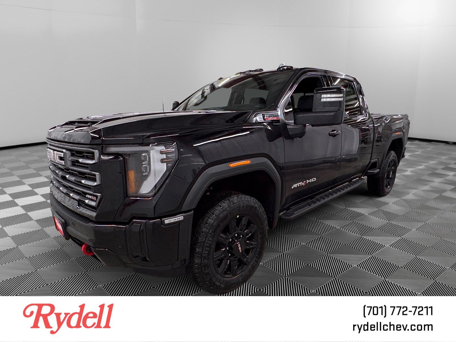 2026 GMC Sierra 3500 HD AT4 in Onyx Black — front three-quarter view
