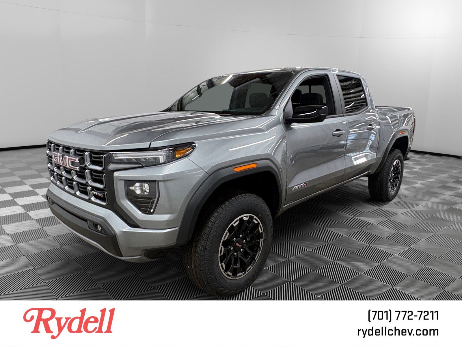 2026 GMC Canyon AT4 in Sterling Metallic — front three-quarter view