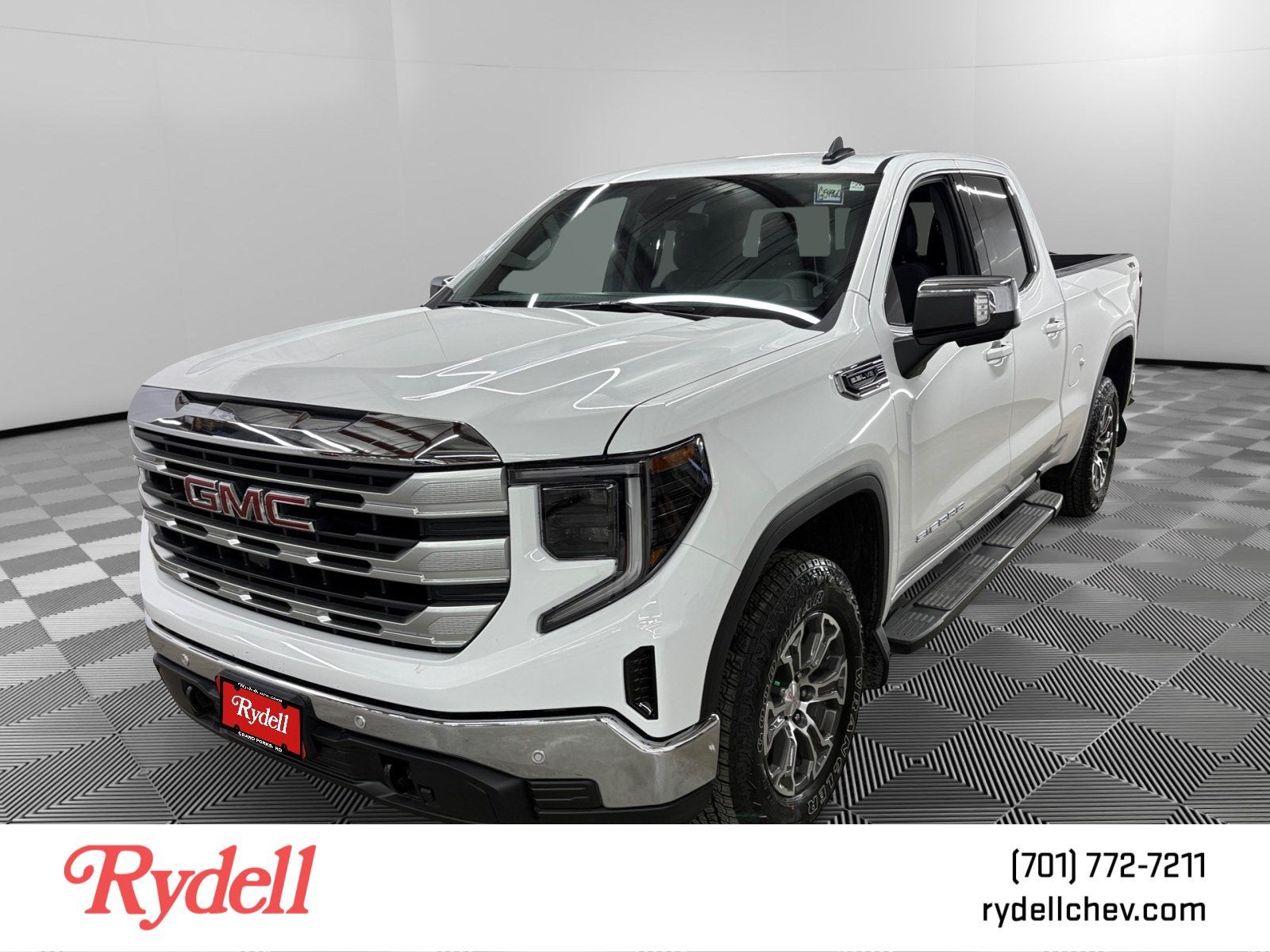 2026 GMC Sierra 1500 SLE in Summit White — front three-quarter view
