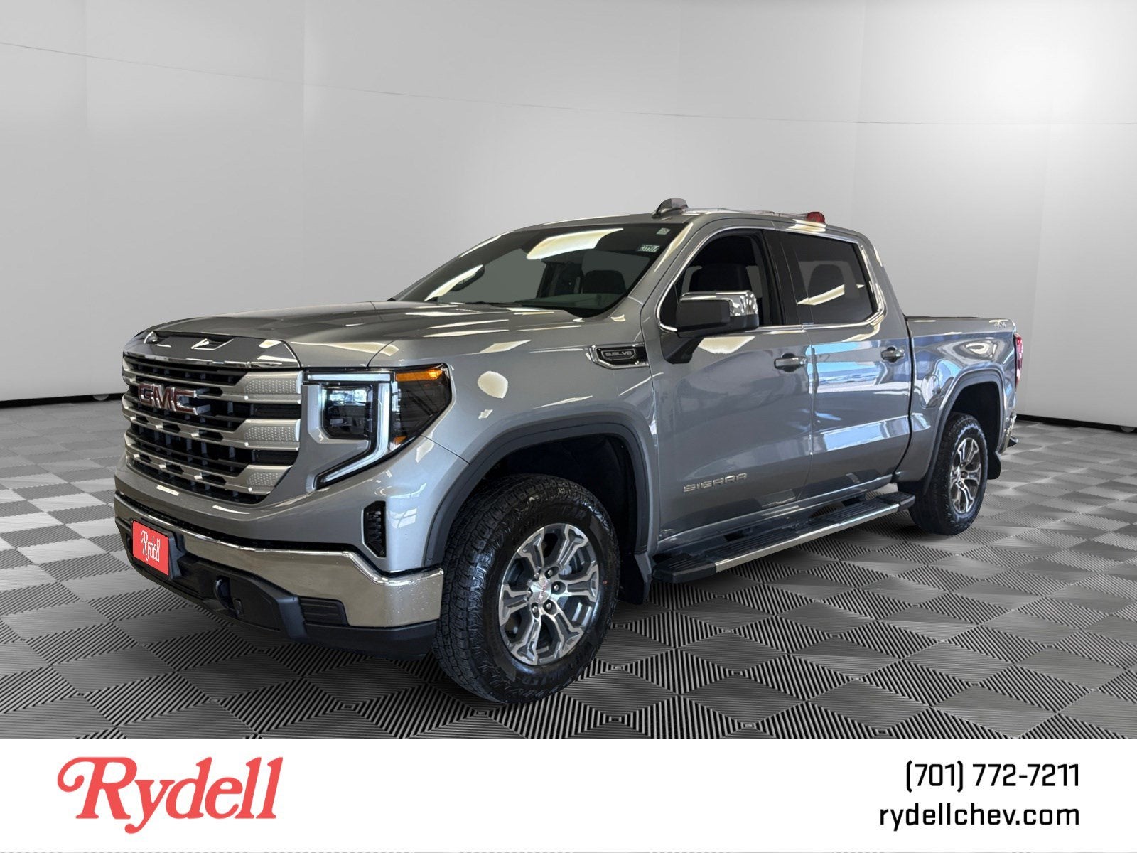 2026 GMC Sierra 1500 SLE in Sterling Metallic — front three-quarter view
