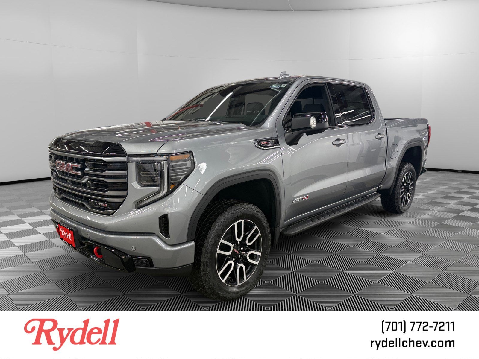 2026 GMC Sierra 1500 AT4 in Sterling Metallic — front three-quarter view