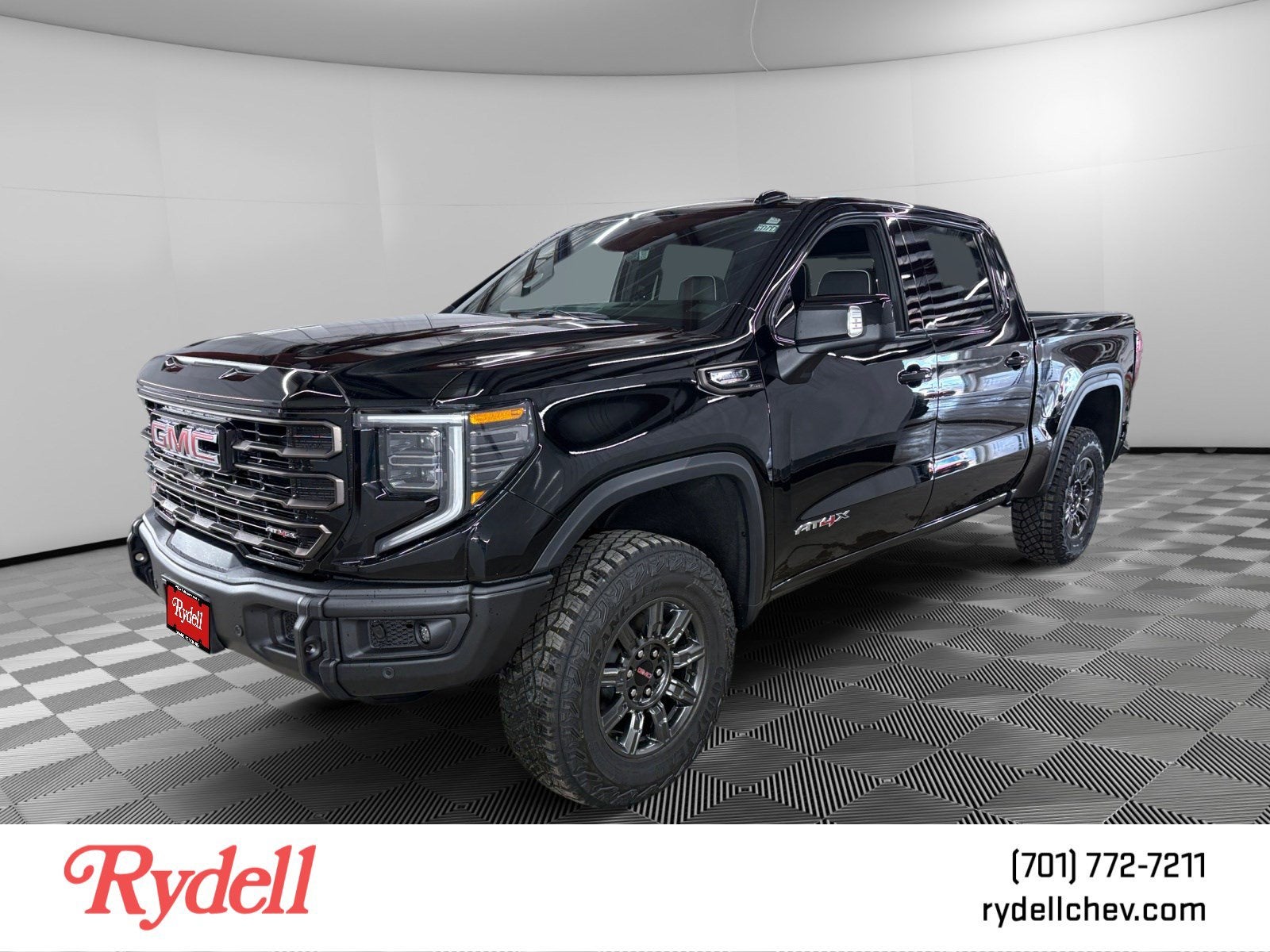 2026 GMC Sierra 1500 AT4X in Onyx Black — front three-quarter view