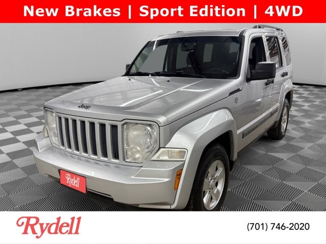 2012 Jeep Liberty Sport in Bright Silver Metallic — front three-quarter view