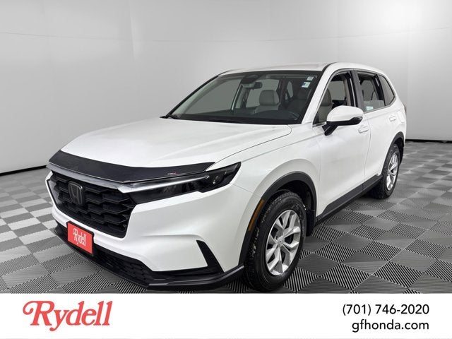 2023 Honda CR-V LX in Platinum White Pearl — front three-quarter view